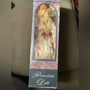 Floral Porcelain Doll with Cream and Pink Dress